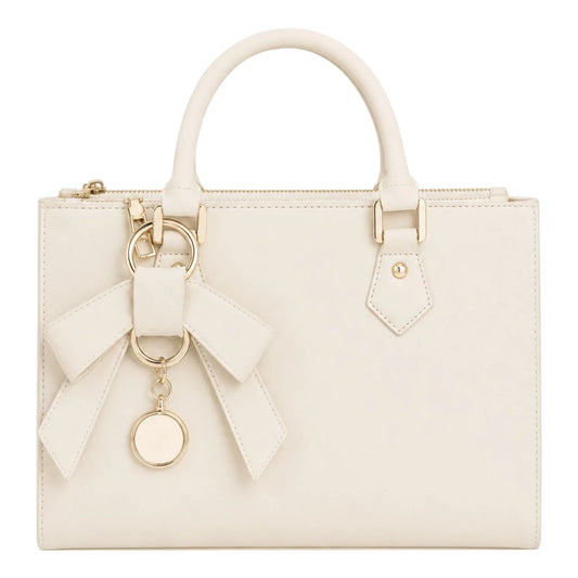 The Perfect Purse LLC Women's Elegant Ivory Leather Handbag with Decorative Bow Charm
